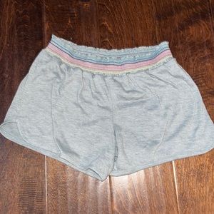 Grey shorts with rainbow on band